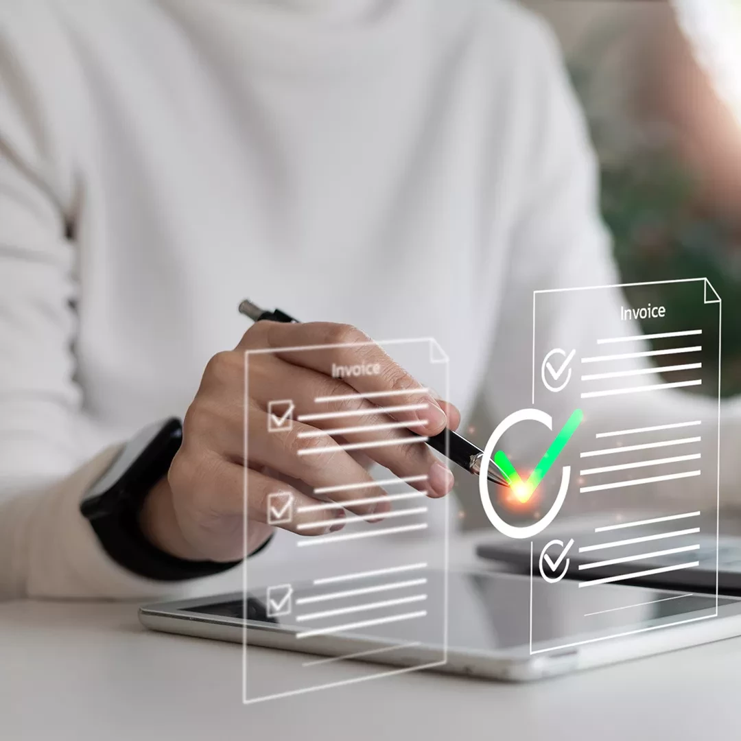 Person using a tablet to pay bills