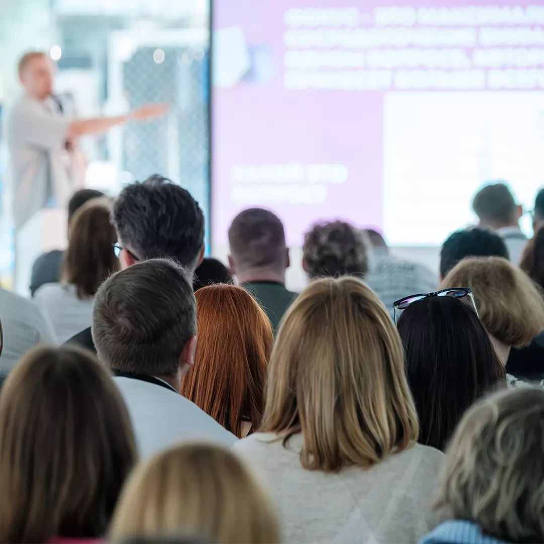 Presenter in front of an audience