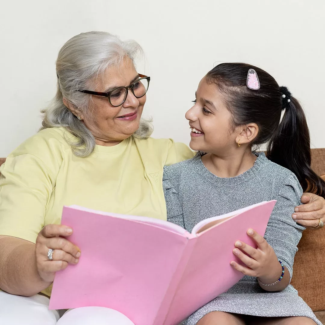 Older woman reading with a child