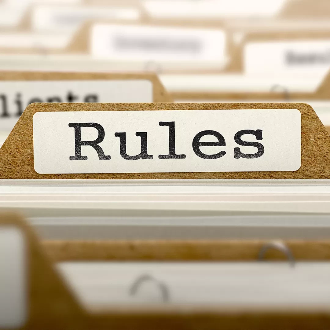 Folder with the word rules on it