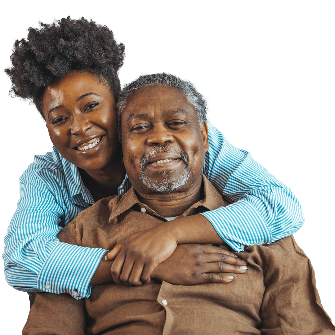 Woman with her arms around an older man