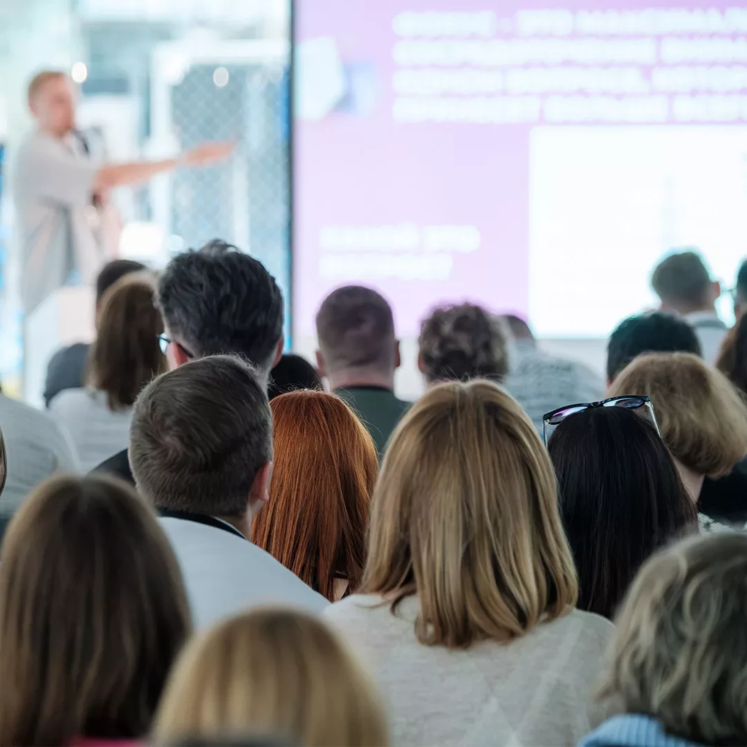 Speaker in front of audience