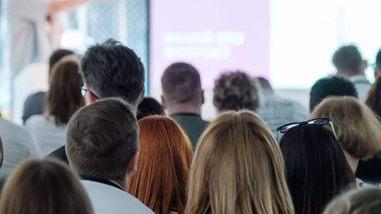 Speaker in front of audience